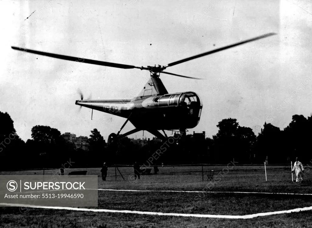 To The Office - By Helicopter -- The helicopter touching down in Regent's Park this morning - after a journey which took some 12 minutes only.Mr. G.S. Lindgren, Parliamentary Secretary to the Ministry of Civil Aviation, went to his office by helicopter this morning. Mr. Lindgren lives at Welwyn Garden City, and climbed into the machine only a few yards from his garden, landing in Regen's Park from whence he completed the journey by car. The Government is buying three helicopters, and Mr. Lindgren was making observations and recording his impressions on the flight. June 27, 1947. (Photo by Fox).