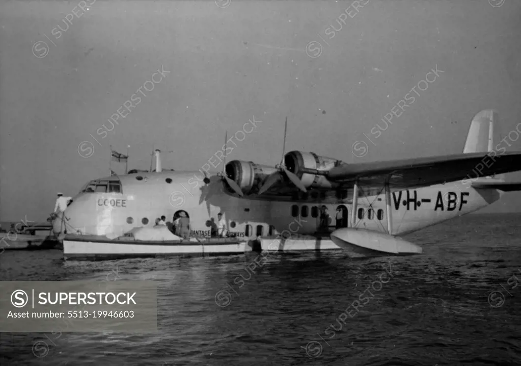 Taking off mails at Darwin. August 30, 1938.