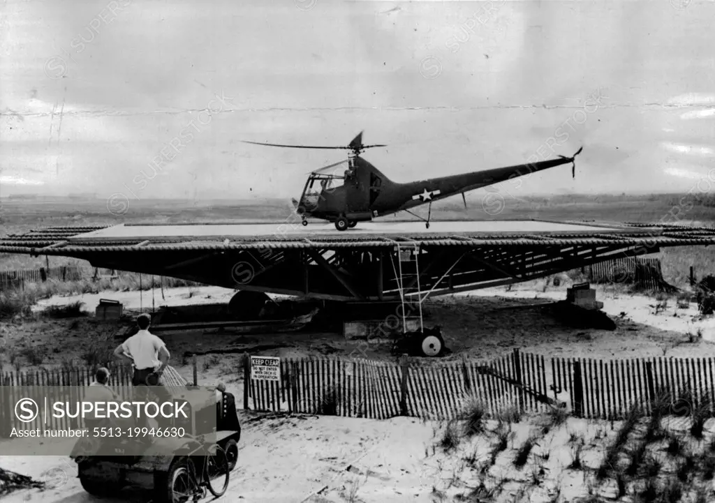 America's First Helicopter Unit -- A helicopter making a ***** the "rolling dack". The U.S. Navy row has a Helicopter Unit - newly ***** on July 1st. At Floyd Bennet Field ***** Air Station, where the unit is stationed, ***** 40 x 60 foot wooden platform, designed to roll ***** and forth while helicopter students simulate landings on a vessel at sea.First Helicopter Unit for the US Navy undergoing tests. The unit is ***** 60 feet wooden platform designed to roll while trainees simulate landing on a vessel at sea. August 24, 1946. (Photo by Acme-British Combine).