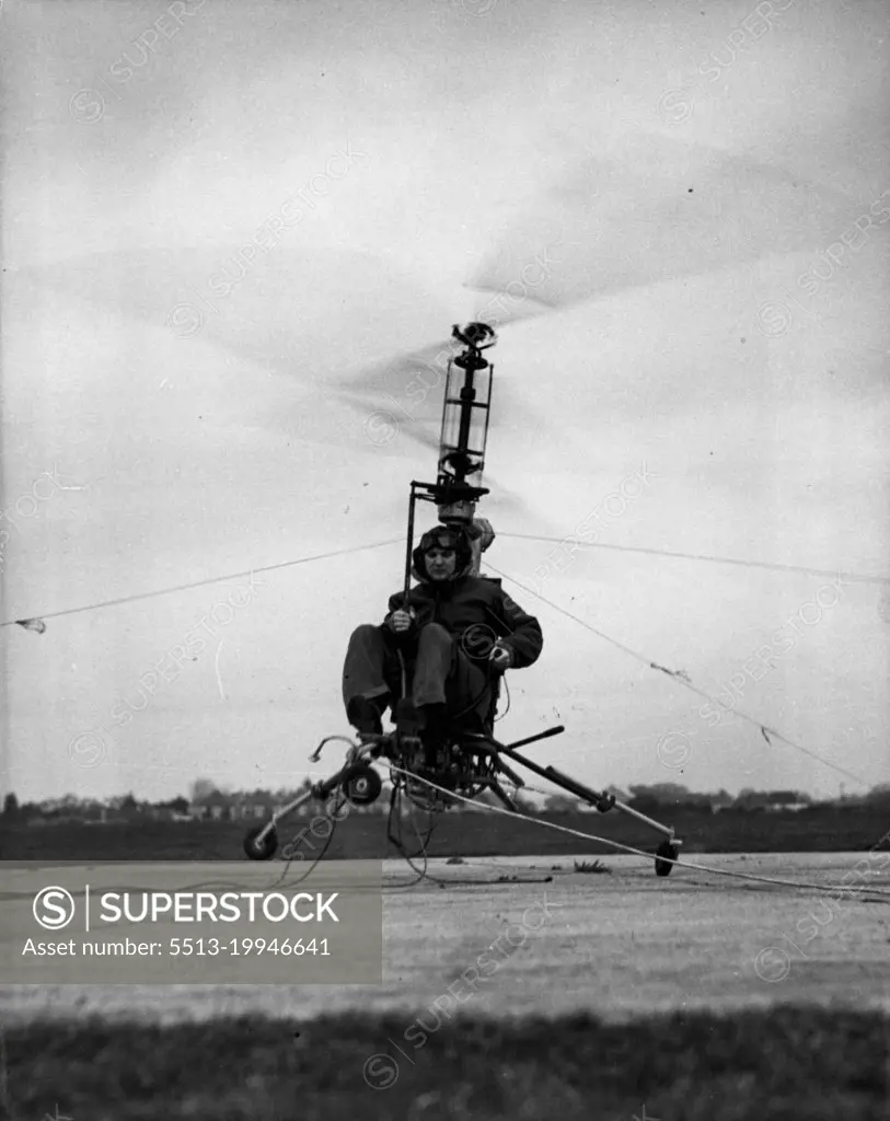 Flying Motor-Cycle Tames The Air -- The 'Hoppicopter' motor-cycle of the air, took the air - in a very small dose - in its first engine tests at Somerford Aerodrome, Christchurch, Hampshire. The 'Hoppicopter' based on the machine designed by the American, H.T. Pentecost, was airborne for only a few minutes, for it was tethered by steel cables. Mr. Berry Martin, managing director of the Winton (Hampshire) factory that built the midget flying machine, piloted it on its first hop. December 12, 1949.