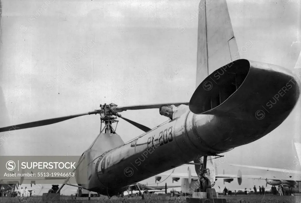 World's Greatest Air Show Will Boost British Exports -- an unusual view of the "Flying Drainpipe" - the Ciervr W.9 helicopter. In this aircraft the normal torque-compensating screw at the tail is replaced by a vent through which gases form the engine are ejected down the tubular construction of the fuselage. Six thousand guests from many countries are attending the world's greatest aircraft exhibition and flying display which opened to-day (Tuesday) at the Handley-page aerodrome at Radlett, Herts, over70 different aircraft, ranging from giant airliners, Jet-propelled military aircraft and private-owner planes to gliders, are there to attract the foreign huyer. September 9, 1947. (Photo by Reuterphoto)