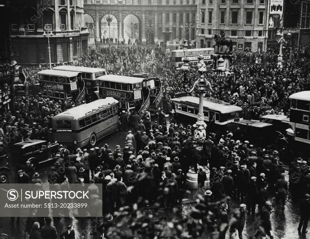 A traffic block caused by the crowd watching the hunger marchers demonstrating in Trafalgar Square. December 12, 1932.