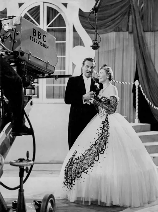 Anne Ziegler and Webster Booth - Anne Ziegler and Webster Booth, singing before the British Broadcasting Corporation's Television cameras at Alexandra Palace, London. Anne Ziegler and Webster Booth are two of the best and most popular British duettists broadcasting today. Each had made a broadcasting reputation before they met and married but as duettists they have now reached the top of the ladder. Webster Booth was born in Birmingham and educated at Lincoln Cathedral Choir School and he was 