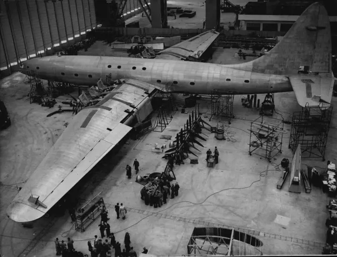 Youth Forum Students See "Brabazon" -- The Youth Forum students inspecting the "Brabazon Mark I", at Filton, Bristol, today March 17. The twenty-six teen-age students who are guests of the Bristol Aeroplane Company today March 17, were shown the giant 130 ton "Bristol" Type 167, "Brabazon Mark I" under construction at Filton, Bristol. The students who are visiting England under the Aegies of the "Overseas Daily Mail" Youth Forum, represent thirteen different countries - Belgium, France, Denmark,