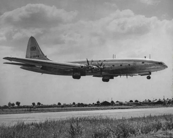 Britain's Giant Takes The Air Maiden Flight Of World's Largest Aircraft -- Taking the air on its maiden flight today from London Airport is the Brabazon, largest aircraft in the world. It carried only 26 passengers instead of its full possible load of about one hundred and was in the air for half-an-hour. Among the passengers were members of parliament and aeronautical scientists. The plane has been built by Britain for a non-stop service between London and New York. July 25, 1951. (Photo by Pau