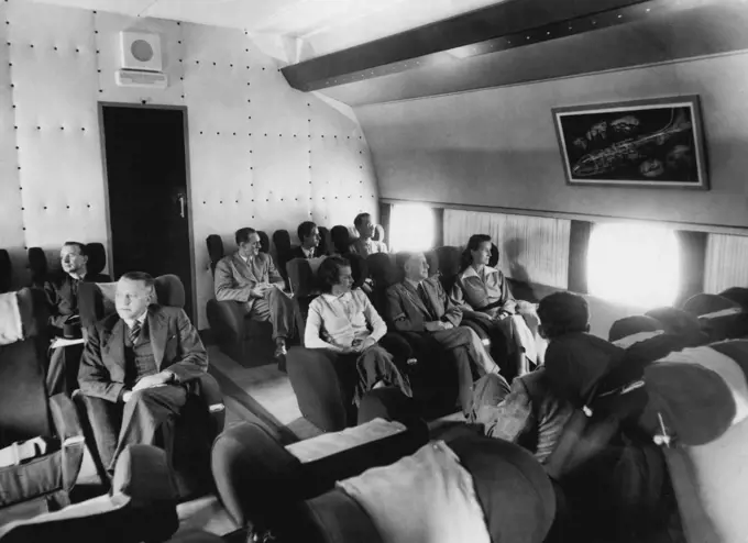 Inside World's Biggest Passenger Plane - First Picture -- This first picture of the interior of the 130-ton Bristol Brabazon shows the spacious six abreast seating, and was made during the "Brab's" visit to London Airport - its first touch-down outside its home base of Filton, Bristol. The eight-engine Brabazon, the world's largest passenger plane, was designed as experimental prototype of planes that will span the Atlantic at 300 miles an hour, carrying 100 passengers in luxury, and up to 230 