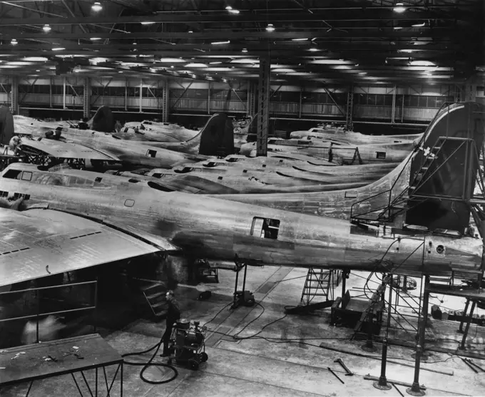 97 Construction Of Aero planes Parts. June 6, 1942. (Photo by Pictorial Press).