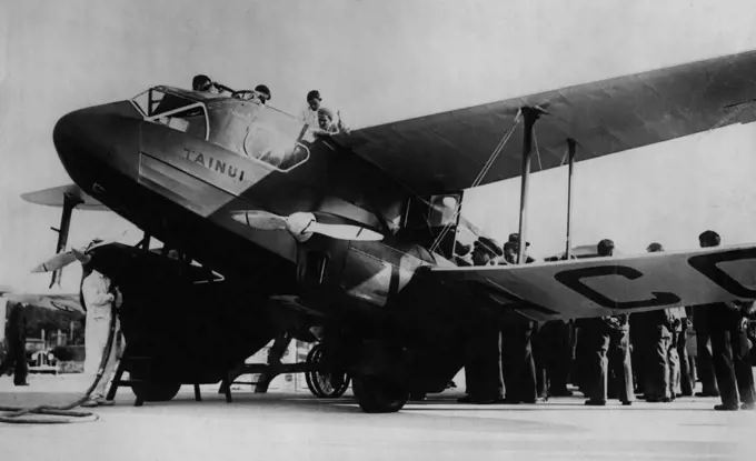 Melbourne Air Race Flyers Pass Through Rome -- J.H. Hewett and C.E. Kay's D.H. Dragon machine photographed on arrival at Rome, during the air race to Melbourne. October 22, 1934. (Photo by Keystone).