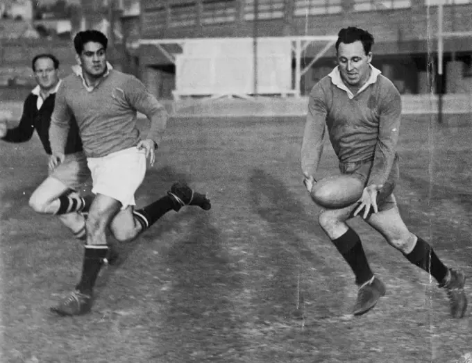 Col Windon, who was lead the Australian Rugby Union forwards in next Saturday's Test against the Maoris, takes a pass during training. June 20, 1949.