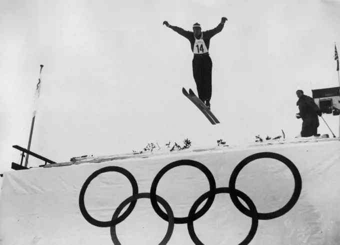 The Winter Olympic Games -- A competitor taking the ski-jump during the combined ski and cross-country event of the winter Olympic Games now being held in Oslo. February 19, 1952.