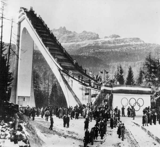 The Winter Olympic Games -- The Striking ski jump, now completed and just waiting for the snow. Preparations are not well ahead for the Winter Olympic Games to be held at Cortina, Northern Italy. December 13, 1955. (Photo by Sport & General Press Agency, Limited).