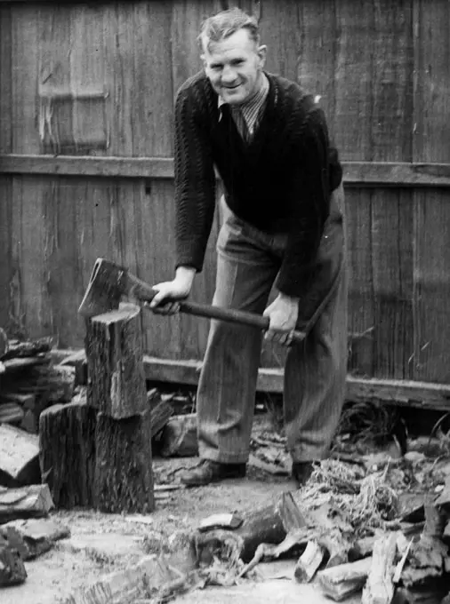 Jack Carroll, welterweight boxing champion, was chopping wood in his backyard at Moonee Ponds when the news was broken to him that the proposed world title fight against Barney Ross was off. October 1, 1936.