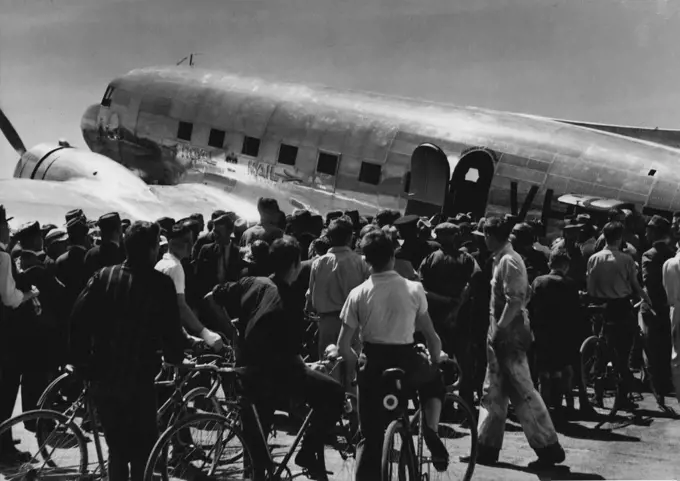 The giant £41,000 Douglas airliner Kyilla and most powerful plane Australia, was surrounded by a crowd of air-minded when it reaches Kingsford Smith Airport today Melbourne. November 12, 1937.