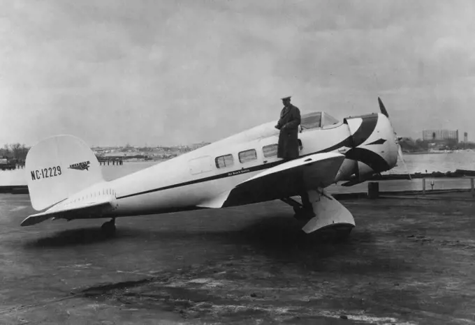 Ja Dickson on wing of Lockheed Orion. November 21, 1932.