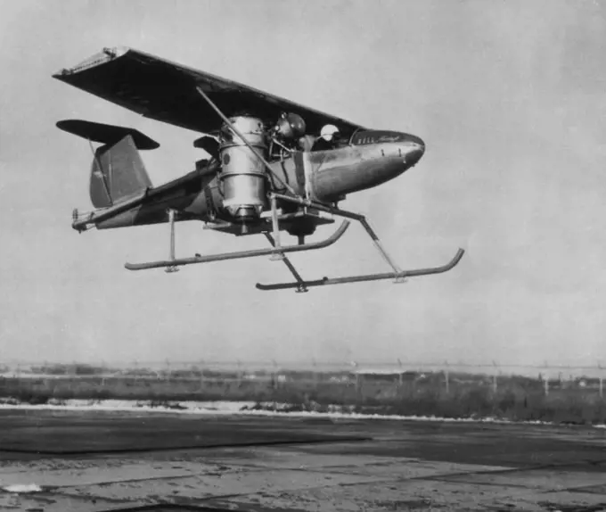 Bell's Experimental Jet-Propelled Vertical-Rising Plane - This is Bell Aircraft Corporation's experimental jet-propelled vertical-rising airplane. Plane is shown taking off on test flight at Niagara Falls, N.Y., airport. Jet engines on either side of this experimental plane's fuselage are designed to be vertical for takeoff and are to revolve 90 degrees for forward flight. February 1, 1955. (Photo by AP Wirephoto).