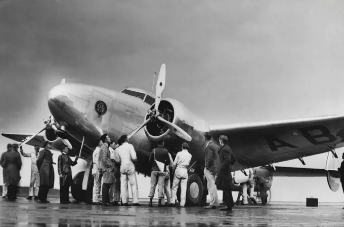 Guinea airways new 12 passengers fockheed ***** the fastest plane in Australia arriving at Essendon from Adelaide on a demonstration tour which will include Canberra & Sydney carries 12 passengers newly 200 tones of ***** at a tap speed of 240 miles her hour due Sydney Friday. June 09, 1938