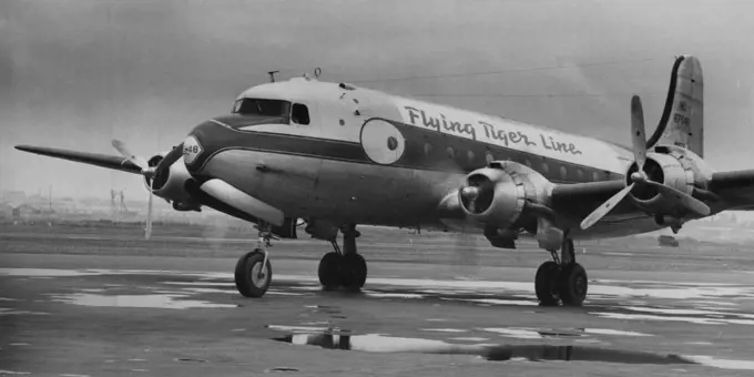 A Flying Tiger migrant Skymaster an arrival at Kingsford Smith airport with Boeing and from Bremen, Germany. The flying tiger line was originally formed by the American wartime flying tiger after the war - has since changed hands. Operate world-wide charter service. February 06, 1951.