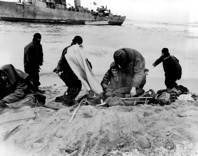 The high degree of teamwork and cooperation among the various United Nations units in Korea was demonstrated recently when the entire crew of Thailand's escort vessel Prasae was rescued by U.S. Navy force after the ship went aground and caught fire during a snowstorm off the Korean east coast. Rescue ships were unable to approach the burning vessel. The Thai crew members then jumped into the joy water in an effort to reach the nearby beach, which was under constant enemy fire. April 4, 1951. (Ph