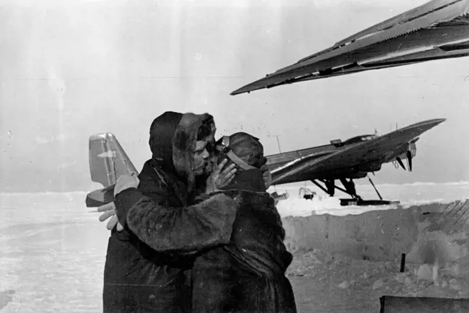 The Soviet Expedition on the North Pole: Ernst Krenkel, wireless operator of the North Pole wintering party, taking leave of one of the members of the expedition, before the planes left the drifting ice-floe for the mainland. June 1, 1937. (Photo by Soyuzphoto).