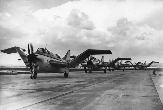 New Aircraft for The Royal Navy. The "Gannets" ***** on the runways after a flight ***** the remarkable features of this *****. The Royal Navy's first unit of Fairey "Gonnet" aircraft, designed solely ***** anti-submarine work, was officially inaugurated at the Royal Naval ***** at Ford, Sussex. Now a "super priority" aircraft ***** "Gannet" will eventually replace the ***** built "Avenger" now serving with the *****. April 6, 1954. (Photo by Sport & General Press Agency, Limited).