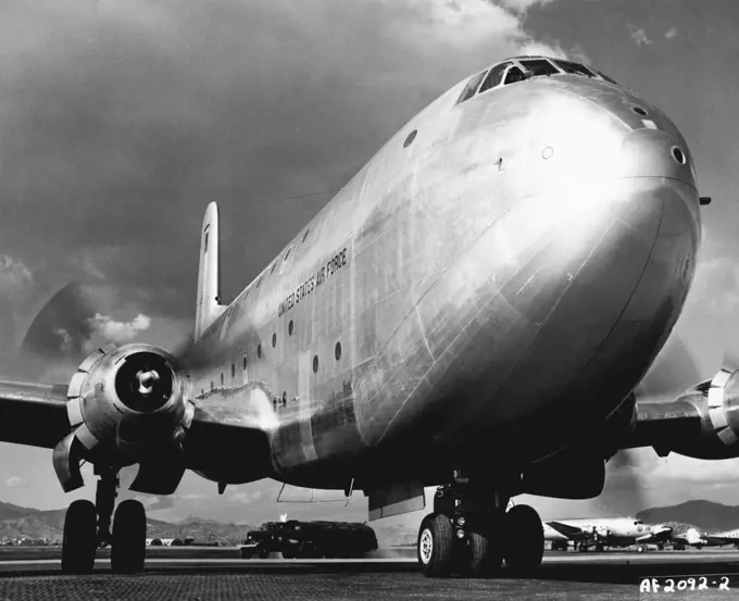 Jimmy Durante Outnosed This unusual view of the nose of a giant C-124 Cloberaaster gives Comedian Jimmy Durante a good run for his money. The picture was taken Just after the aircraft had taxied to the parking ramp of an airlift base somewhere in Korea. The 315th Air Division (Combat Cargo) which operates the airlift between Japan and Korea carrying troops and cargo recently placed the C-124 into regular service. The huge aircraft can carry 200 troops or 127 litter patients with attendants or 3