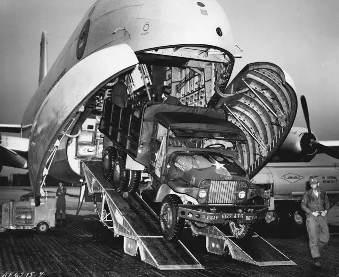 Pakistan Bound Globemaster Loaded in Korea A. U.S. Air Force truck is loaded on a C-124 Globemaster at an Air Force installation in Korea for airlift to the flood-stricken area of East Pakistan. In the joint Air Force-Army mercy mission, 40 members of the U.S. Army 37th Medical Preventative Medicine Company and nearly 30 tons of medical supplies left Seoul, Korea aboard two Globemasters. Six other C-124s are also taking part in the mercy airlift. August 17, 1954. (Photo by U.S. Air Force Photo).