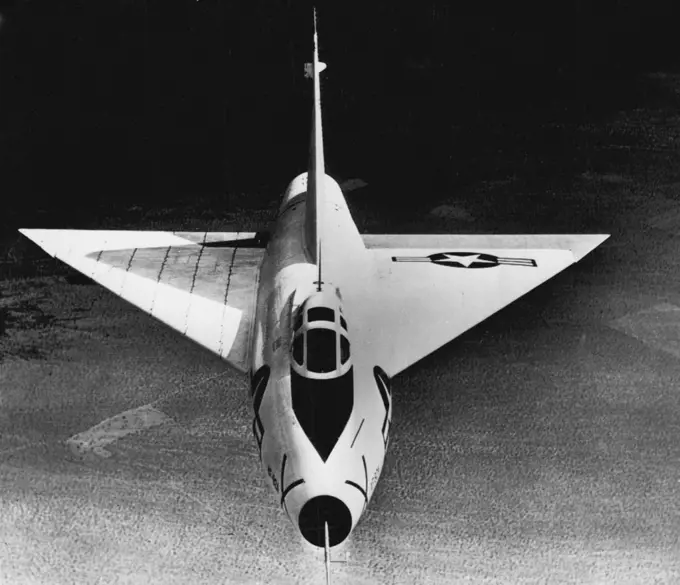 A Dart Over The Desert -- A photographer in the tail gunner's position in a B-25 bomber captured this head-on flight view of convair's XF-92A research interceptor high over California's Mojave desert. The picture is the first of its kind released. The plane, being piloted by Maj. Charles E. Yeager, first man to fly faster than sound, is the fore-runner of the XF-102 supersonic delta wing interceptor recently ordered into production at Convair's San Diego plant. Parallel lines on wing at left ar