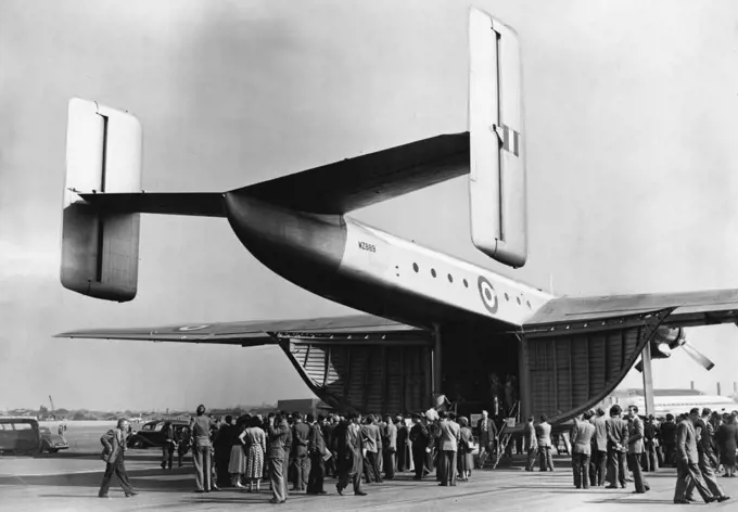 Flying Display And Exhibition Opens Today At Farnborough Aerodrome, Hants - Crowd queueing up to inspect the Blackburn General Aircraft Ltd. Prototype Beverley, a freighter, at the Exhibition today. Large crowds today attended the 1953 Flying Display and exhibition, showing the products of the Members of the Society of British Aircraft Constructors, which opened today at Farnborough Aerodrome, Hants. September 07, 1953. (Photo by Fox Photos).