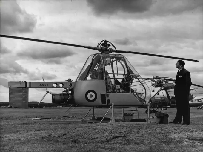 Farnborough 1955 -- the Fairey Ultra Light.. one of the smallest helicopters.. will be used by the army. The Farnborough air show opens today. Organised by the society of British aircraft constructors it includes many new planes and overall continues to show the world what Britain can do in the air. September 5, 1955. (Photo by Paul Popper Ltd.).