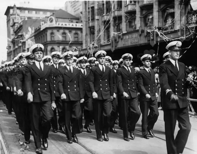 Petty Officers marching along Swanston SA just fast the saluting base. Trafalder Day. October 21, 1941.