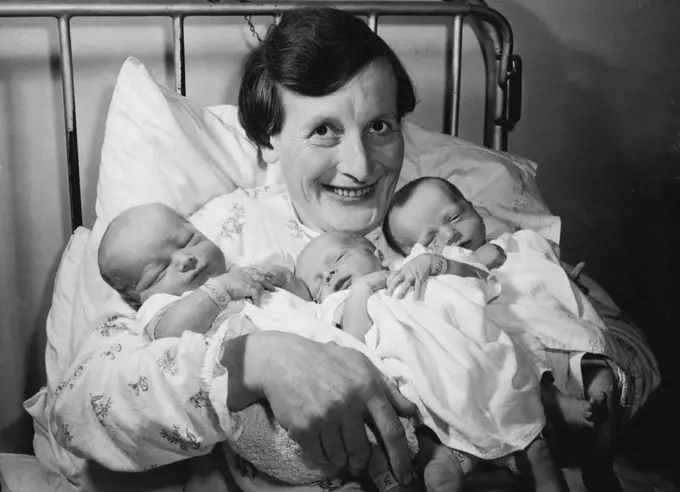 Ernie Constable, 38, set to work yesterday clearing furniture from the front room of his house.Ernie, a £12-a-week cement worker, had to find room for three babies, bringing his total to 17.His wife, Mabel, 37, (pictured) gave birth in hospital to triplets two boys and a girl The baby girl weighed 6lb 1oz, and her brothers 4lb 13oz and 7lb 2oz. Room Problem - Non-smoker, non-drinker Ernie has found it difficult enough to find room for 16 people in his three-bedroom home at Long Itchington, Warwi