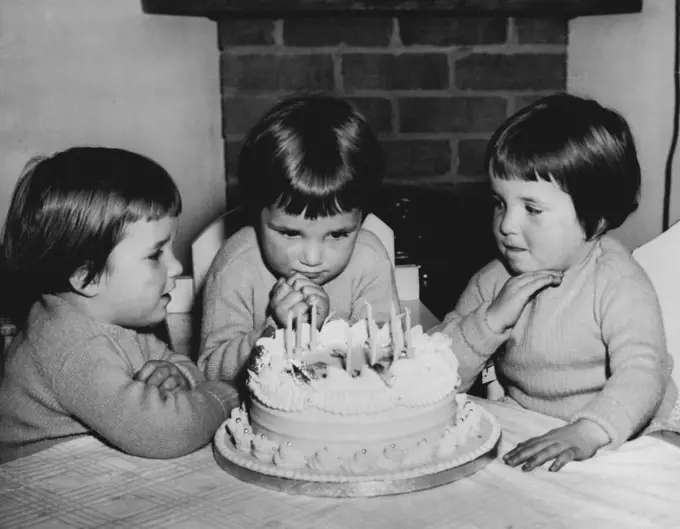 Big Blow. Three sets of three candles solved triplets birthday problem. Lynette (left), Annette and Jeanette Bishop of Brussels St. Mascot who are three years old today had a prebirthday blow before they went to bed last night.The Bishop triplets Annette, Jeanette and Lynette blow out their joint birthday cake. August 05, 1951.