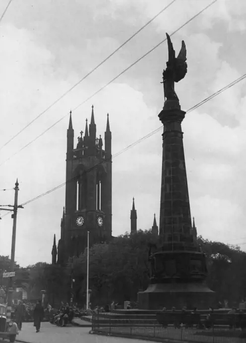 Newcastle-On-Tyne -- The South African War Memorial stand in Haymarket, with St. Thomas' Church in the background. September 03, 1951. (Photo by Pictorial Press). 