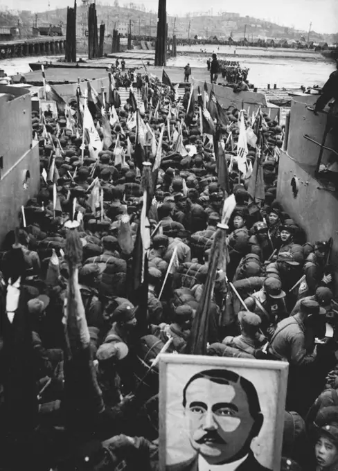 Korea POWs En Route to Chiang Kai-Shek -- A loaded transport craft heads out into Inchon Harbour with Chinese to transfer them to the ships which will take them to the Island of Formosa. Photo made January 21. Following the release of nearly 22,000 Chinese and North Korean prisoners of war by their Indian custodians, thousands of Chinese have been streaming to Inchon to board tank-landing craft which will take them to Formosa. American warships and planes will escort them to the Nationalist China island ruled by Chiang Kai-Shek. The trip will take three days. February 11, 1954.