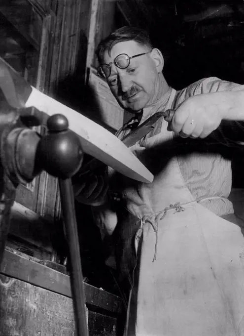 Man who has over half a Century's Experience at making first class Cricket bats for most of the World's greatest batsman is Mr. George hunt who runs a little workshop close by lord's cricket ground. George Hunt, who runs a little workshop close by Lord's cricket ground, has been making bats for many of the worlds greatest batsmen for more than 50 years. One of the shops expert craftsmen, 66- year-old F. Church at work. Last time the English team visited Australia, an accompanying friend took some of Hunts bats for the Australians to try. Hassett and Miller each got a century at their first innings with the bats. May 30, 1953. (Photo by Paul Popper Ltd).