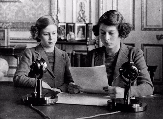 Royal Princess At The Microphone -- Princess Elizabeth and Princess Margaret at the microphone. Princess Elizabeth made her first broadcast to-day. October 12, 1940. (Photo by Topical Press).