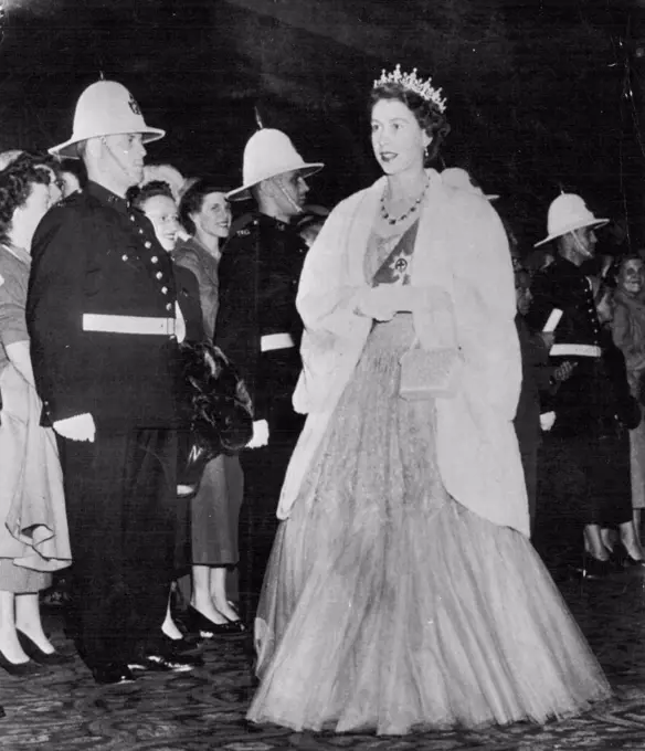 Princess Arrives For State Dinner -- Princess Elizabeth walks past Quebec Police on her way to the State dinner at the Chateau Frontenac here tonight. November 15, 1951. (Photo by AP Wirephoto). 