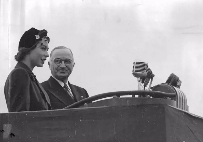 Princess Elizabeth Meets The President -- Princess Elizabeth with the President facing a Barrarge of Microphones after her arrival at Washington Airport. Princess Elizabeth and the Duke of Edinburgh have broken their Canadian tour to spend a few days in the United States at the Invitation of President Truman. November 02, 1951. (Photo by Paul Popper Ltd.). 