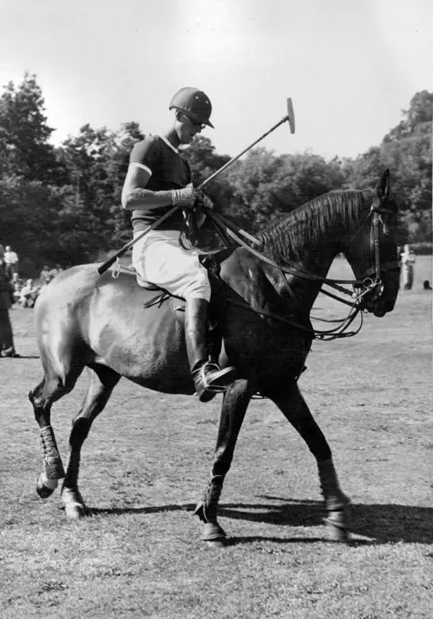 The Duke of Edinburgh Plays Polo -- The Duke of Edinburgh takes the field for the polo match on Saturday, 28th July. The Duke of Edinburgh played polo for the Maidensgrove team against Hertfordshire in the 2nd round of the Cowdray park Junior challenge cup, At the Sutton park polo club ground. The Duke scored 2nd goal to help his team to win by 4½ to 2. July 30, 1951. (Photo by Fox Photos).