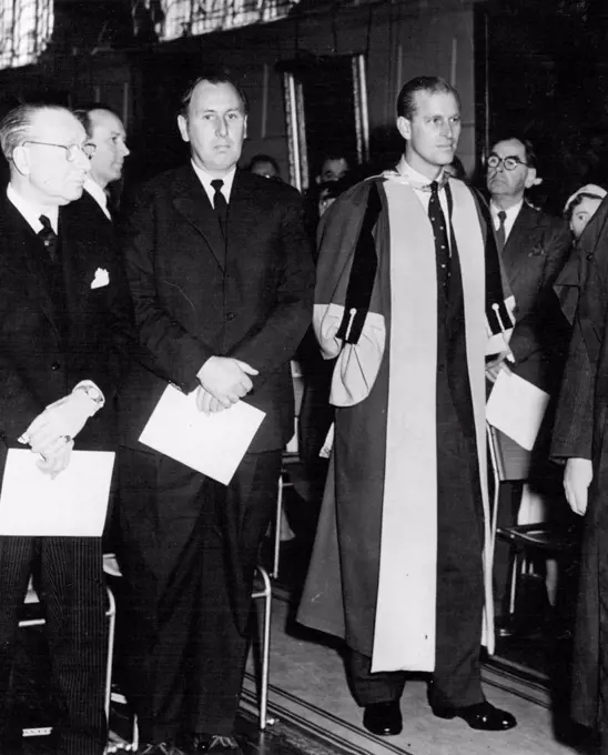 The Hon. Fellow -- The Duke of Edinburgh in the robes of Honoury Fellow of the Royal College of Arts had the convocation of the R.C.A. which the Duke visited on Friday. July 8, 1955. (Photo by London Express News and Feature Services Picture). 