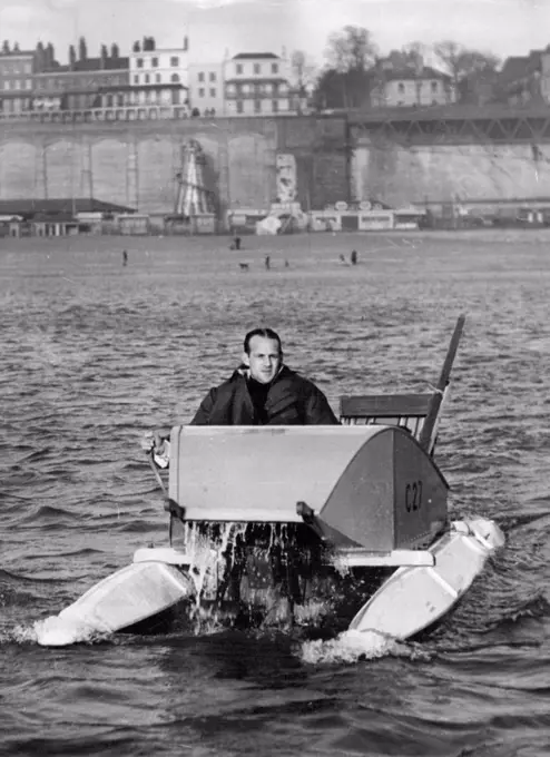 Off On Trio-Way Fedal Crossing Of The Channel: Mr. Jacquise Du Preaire Pedalling away from Ramsgate at the start of his Channel-crossing to-day. Mr. Jacquise du Preaire, 30-year-old ex-Commando of Goring-on-Sea, Sussex, set off from Ramsgate, Kent, to-day (Sunday) on a double crossing of the Channel by pedal-craft. He is wearing a new type of life-saving suit which is water-and wind-proof and holds the heat. It will blow up like it ***** if he falls in the water. Mr. du Preaire, to make Calais in eight to ten hours. He plays to continue from there along the French coast to Le Kavre and re-cross the Channel to Southesea, making a total of 260 miles. January 25, 1953. (Photo by Reuterphoto).