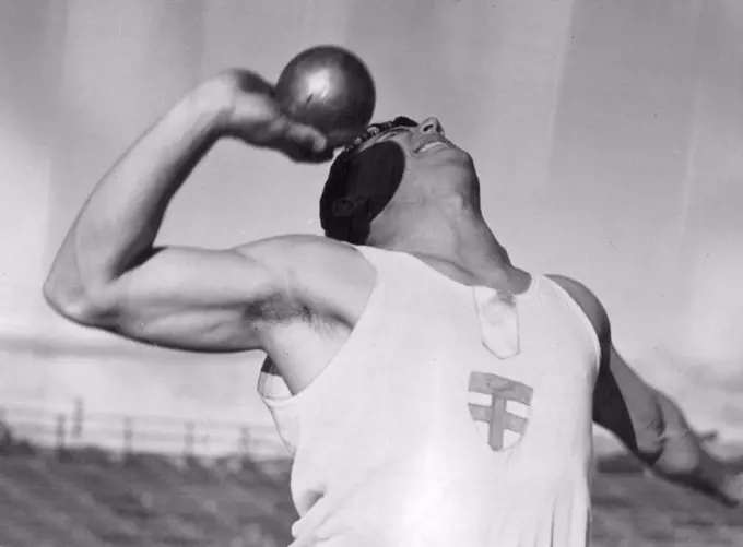 L.C. Ariotti (Sydney) winning the shot putt at the 30th Australian Inter University Championships, Brisbane May 24. May 26,1939.