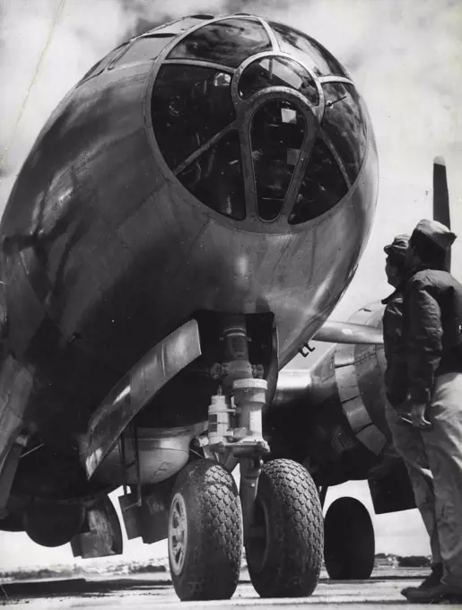 This Superfortress, flight leader in 29 combat missions over Tokio, and other important Japanese cities, arrived in Sydney yesterday on its way to Melbourne. Lent by General MacArthur to aid Australia's Fourth Victory Loan, this plane, which has been re-named Waltzing Matilda, will visit all Australian airfields that can accommodate it to give bond buyers special flights. It will return to Sydney later in the month. October 2, 1945.