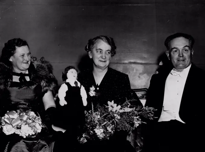 Old Student's Association President Mrs. A.J. Husband and PLC head mistress Miss M.F.B. Neilson with School Council Chairman Mr. Justice Dean. There were 10 debutantes at the annual ball arranged by old students of Melbourne Presbyterian Ladies College at St. Kilda Town Hall. August 22, 1952.