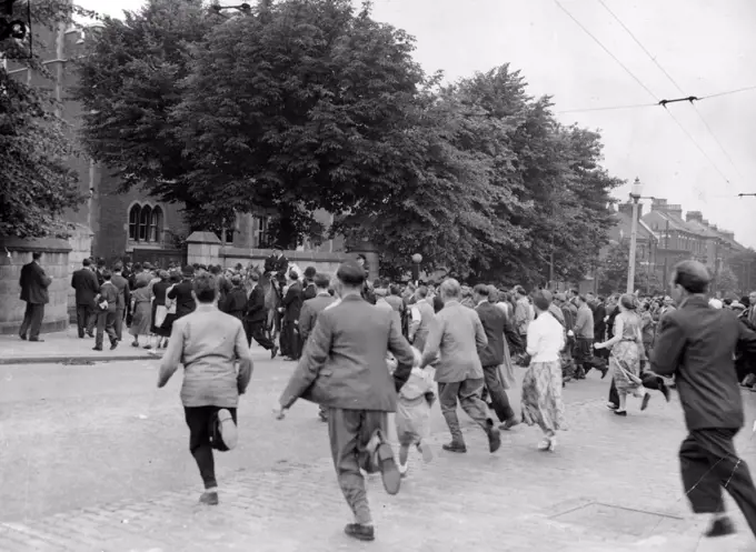 Ruth Ellis Is Hanged -- Crowds Rush across the road at Holloway Prison, London, This Morning July 13 to Read the official notice Saying Ruth Ellis had been Hanged. She was Executed for the Murder of her Lover, David Blakely, a racing motorist, and was the 14th Woman hanged in Britain This Century. Mounted Police were needed to keep the crowds in order outside the Gaol. July 21, 1955. (Photo by Associated Press Photo).