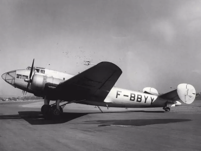 The first aircraft of its type to come to Australia, this unusually designed Leo 453 photographic survey plane designed and built in France in 1937 flew from Indo China to Brisbane on its built in France in 1937 flew from Indo China to Brisbane on its way to New Caledonia, where it will make high-altitude survey flights during the next two to three months for the National Geographical Institute of France. Note the unusual dihedral tail assembly and the low-slung fuselage. It is fitted with special cameras for its oil and mineral survey role. May 6, 1954. (Photo by The Telegraph Feature Service).