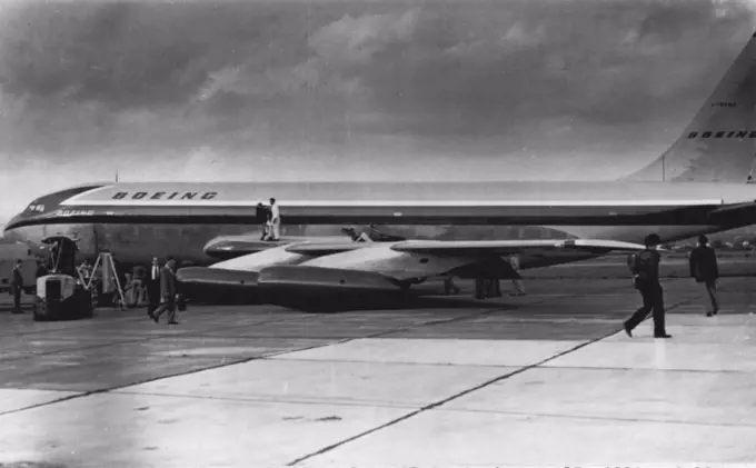 New Jetliner Damaged-Boeing's new 15-million-dollar Jet transport squats on runway after the left landing gear buckled during taxi tests late yesterday. A portion of the damaged wing flap can be seen above wing next to fuselage. The accident will delay first flight several weeks. Boeing engineers estimated. May 22, 1954. (Photo by AP Wirephoto).