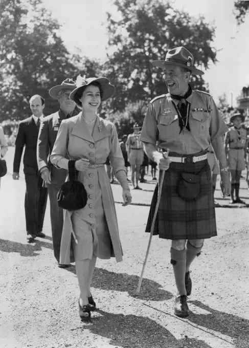 Princess Review's Commonwealth's Jamboree scouts. - Princess Elizabeth walking with the Chief Scout, Lord Rowallan, during her review of Contingents from the British Commonwealth who are to attend the forthcoming World Jamboree in Austria, The grounds of Clarence House, London home of the Princess, was the venue for the review. July 28, 1951.