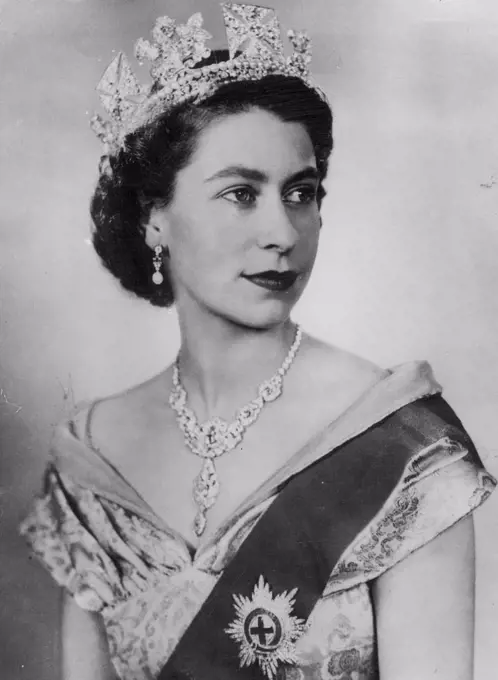 Queen's First Portrait Since Her Accession In the first formal portrait study to be taken since her accession to the throne, Her Majesty Queen Elizabeth II is seen in a gown of ivory brocade woven with gold and turquiose thread and with thrquoise velvet neckline. She is wearing the Sash and Star of the Order of the Garter, the necklace which was given her as a wedding present by the Nizam of Hyderabad, and a circlet of diamonds and pearls. July 8, 1952. 