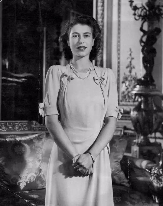 The Royal Bride This smiling picture of H.R.H. Princess Elizabeth Heiress presumptive to the Throne, was specially posed for in the White Drawing Room of Buckingham Palace in connection with the Princess's wedding on November 20th to Liuet, Philip Mountbatten, R.N. September 5, 1947.